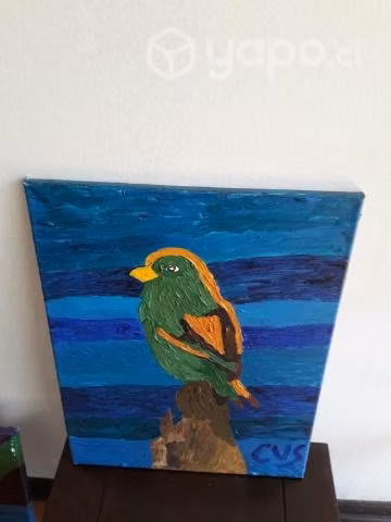 Cuadro pájaro verde sobre roca