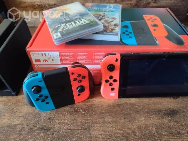 Nintendo Switch + dos juegos y dos controles