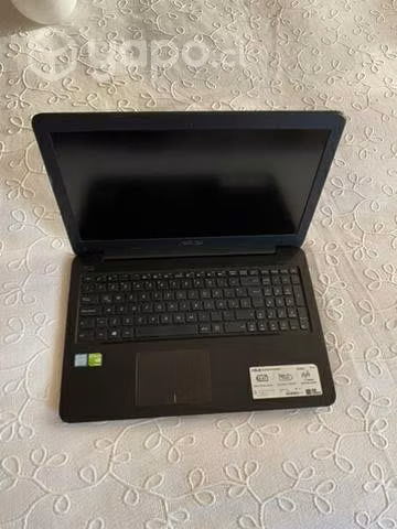 Notebook ASUS con accesorios - Imagen 2