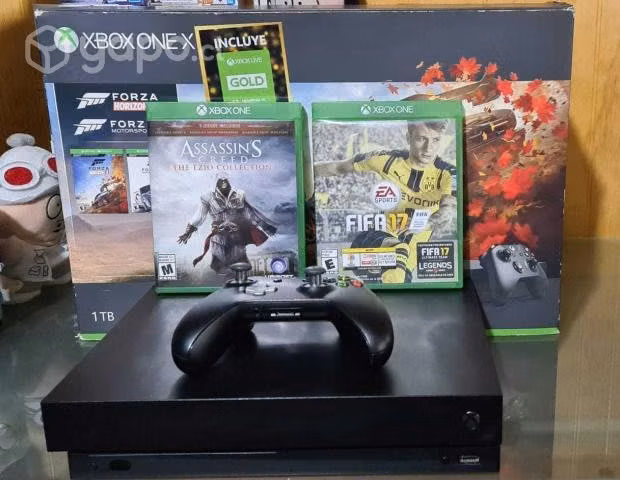 Xbox one x con caja