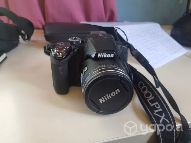Camara NIKON Casi Nueva Impecable con Bolso