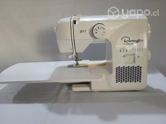 Máquina de coser portátil Remington + mesa ext
