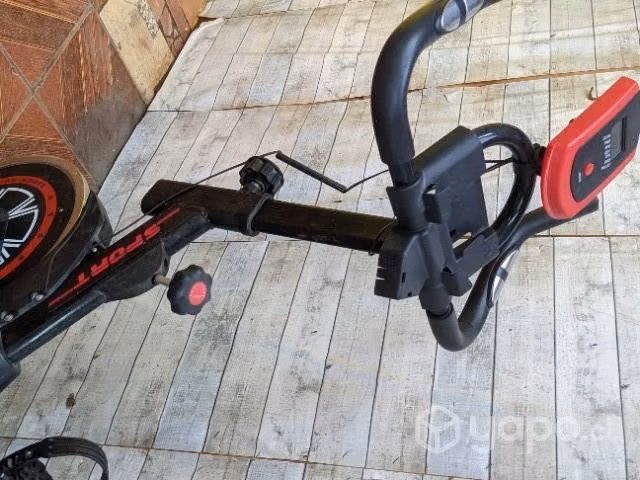 Bicicleta estetica snipining y máquina muscular