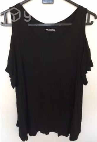 Polera Melocoton Talla XS (negra AN)
