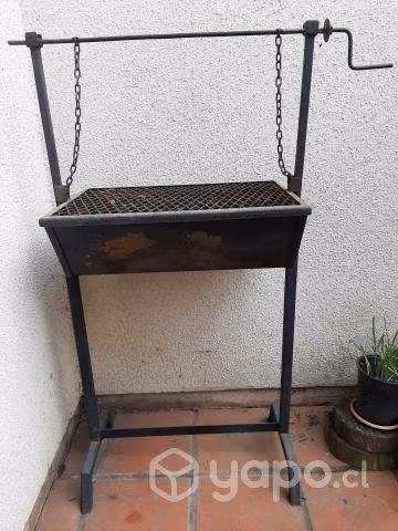 Parrilla con regulador de altura