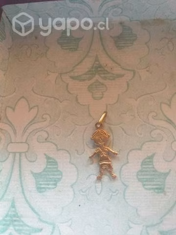 colgante de niño oro 18 kl