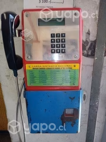 Funcionando teléfono público tamura metalico