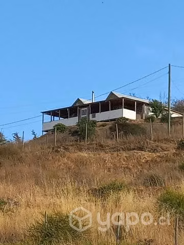 Parcela con casa