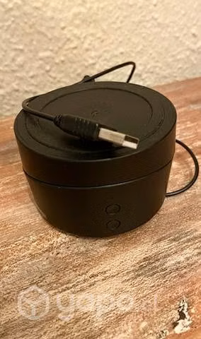 Parlante Bluetooth y cargador inalámbrico