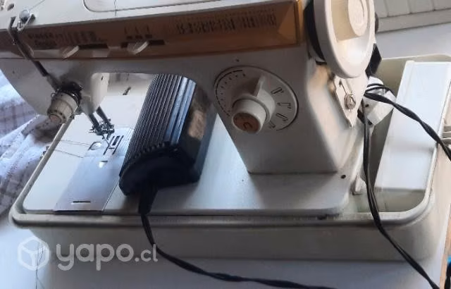 Maquina de coser singer 974