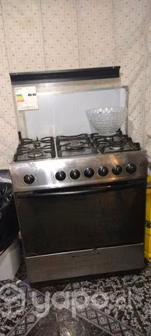 Cosina con chispero, luz (poco uso.)