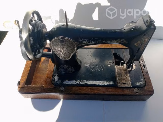 Maquina singer antigua