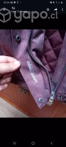 Origuinal casaca con gorro desmontable..