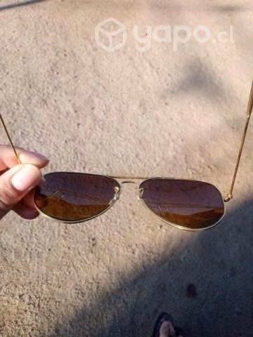 Lentes ray-ban modelo aviador dorado - Imagen 5