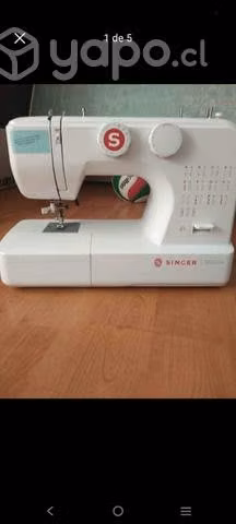 Maquina singer SM024, con telas y accesorios