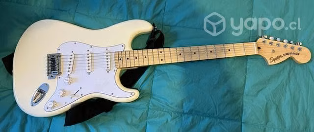 Guitarra squier + marshall mg15gold