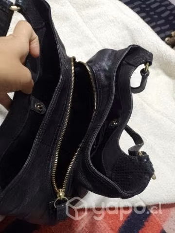 Cartera Coach