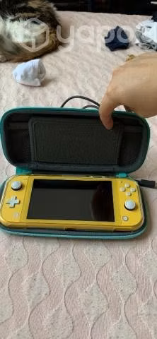 Nintendo switch lite muy poco uso