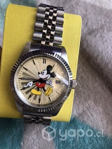 Audífono + reloj