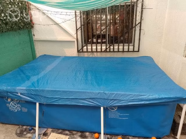 Piscina usada 60.000 sin bomba de agua,con toldo