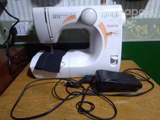 Maquina de coser toyota - necchi