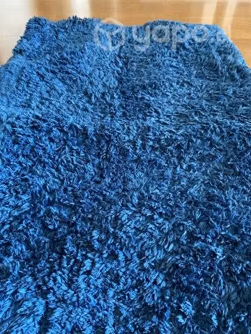 2 alfombras azules
