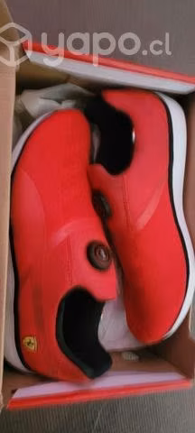 Puma ferrari con boton apretar a el pie