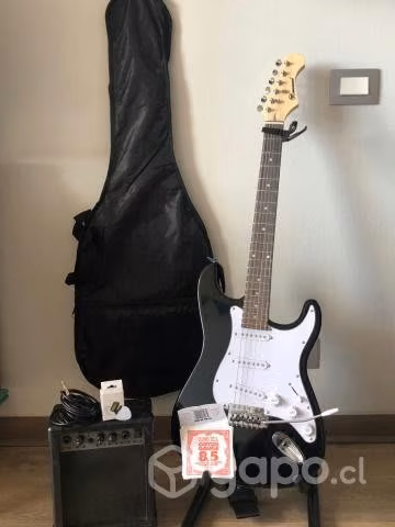 Guitarra eléctrica con amplificador y accesorios