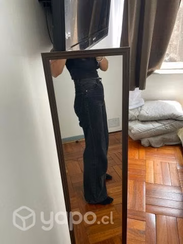 Pantalones negros acampanados