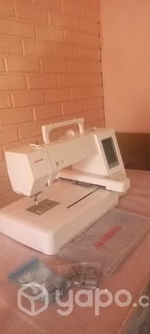 Máquina bordadora mc400e