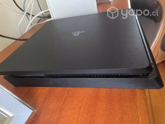 PlayStation 4 Slim + 1 Control + 7 Juegos