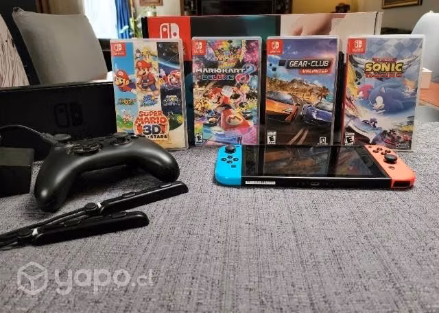 Consola nintendo switch con accesorios y juegos
