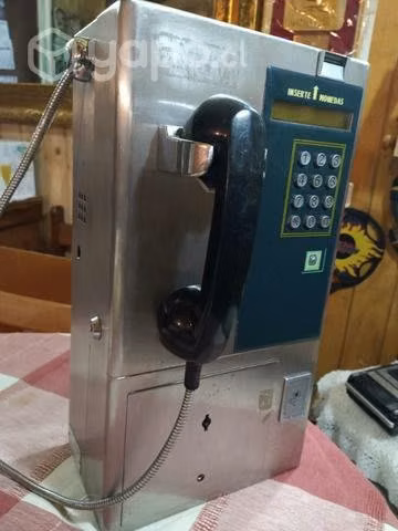 Antiguo teléfono publico,decoracion adorno lindo