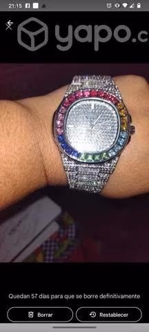 Reloj con brillantes y piedras preciosas
