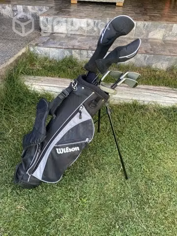 Palos de golf junior y carro de arrastre