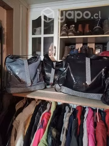 Carteras,mochilas y parcas