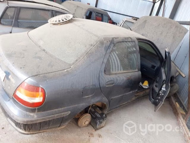 Tapamaleta fiat siena 2004