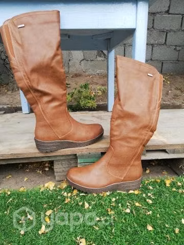 Botas nuevas via uno