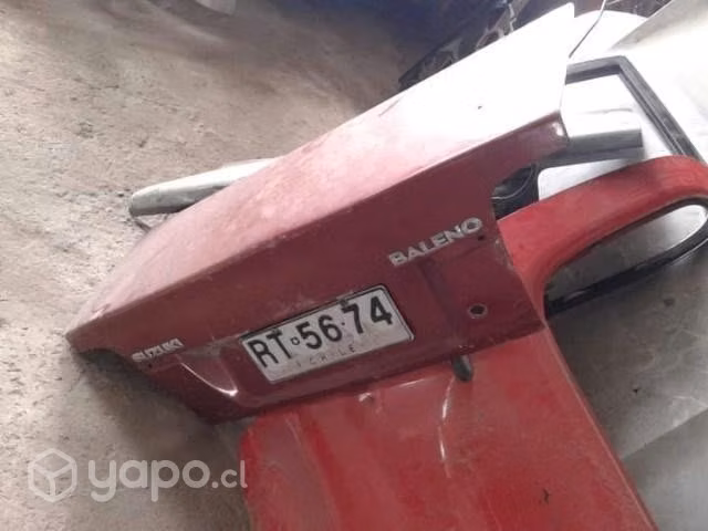 Tapamaleta original Suzuki baleno 2000