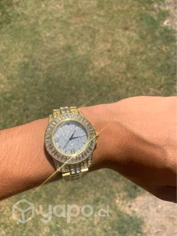 Reloj de hombre o mujer dorado