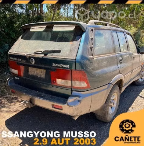 Tecla alza vidrio Ssangyong Musso 2.9 aut 2003