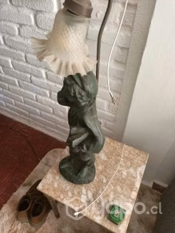 lámpara escultura diarero