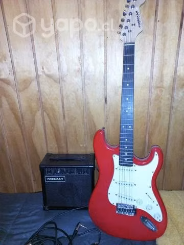 Guitarra Eléctrica, cable y amplificador