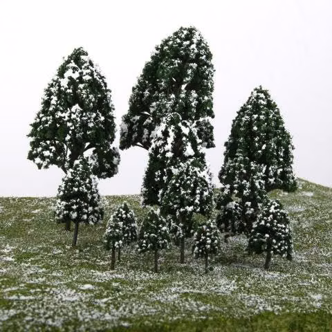 Set de 12 árboles nevados, distintos tamaños