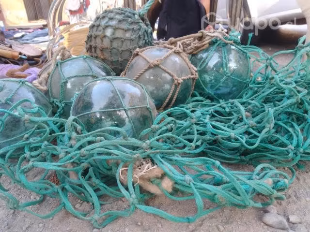 Boyas de barco antiguas de vidrio trenzada en cuer