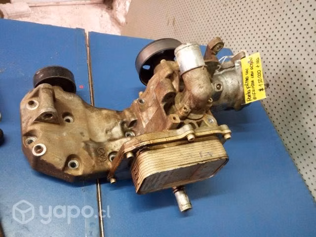 Porta filtro de aceite con bomba de agua y enfriad