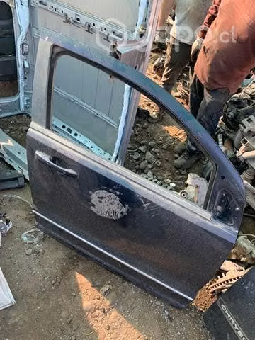 Puerta delantera derecha dodge caliber