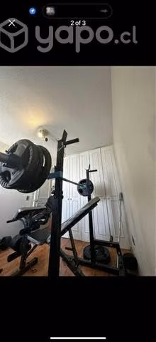 Barra olímpica + 90kg discos + rack squat + banca