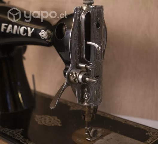 Antigua maquina de coser, marca Fancy