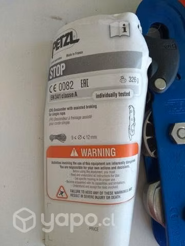 Descensor Petzl nuevo en su caja y catálogo